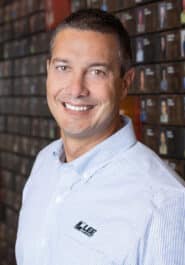 Executive Headshot of Justin Braden