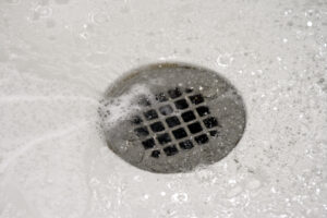 Why Does My Shower Drain Keep Clogging? | Lee Company
